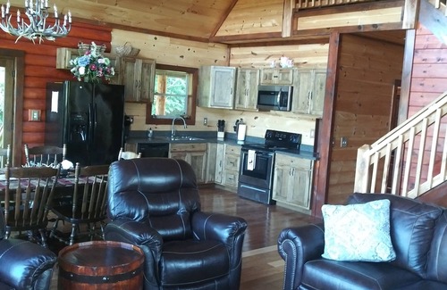 Fort Payne Cabin | Private fishing pond with cabin and hot tub! Perfect vacation spot.