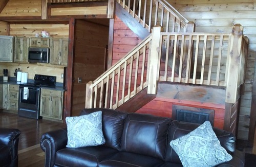 Fort Payne Cabin | Private fishing pond with cabin and hot tub! Perfect vacation spot.