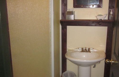 Pembine Apartment | Private French-themed room with shared baths kitchenette