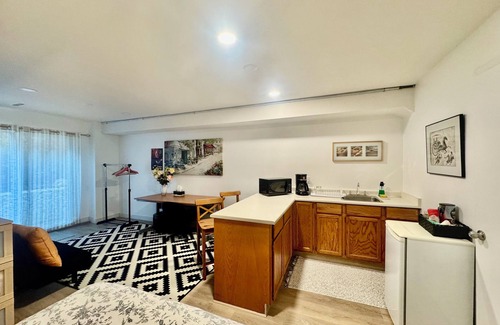 West Vancouver House | Private guest room with separate washroom and entrance