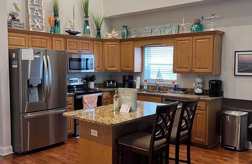 Biltmore Beach House | Private heated pool! 1 minute walk to beach! Ocean views! Sleeps 16! Game Room!