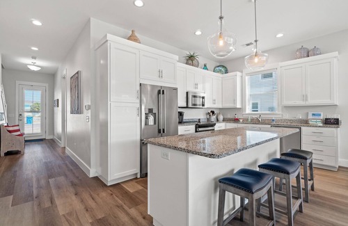 Silver Sands Beach House | Private heated pool! High speed internet -beach chair service included