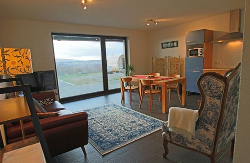 Bruschied Apartment | Private holiday apartment in the Hunsrück with a wonderful valley view and cedar sauna