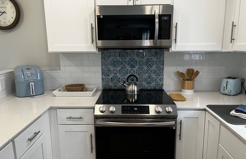 Manistee House | Private Hot Tub, Outdoor TV, near Downtown & Lake Michigan Beaches!