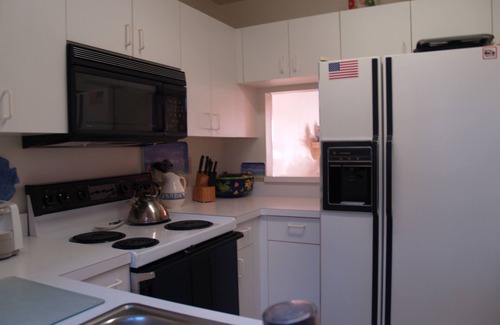 Whitney Beach Condo | Private Isle. 24 hr, gated, guarded.1 mile from white sand beach. 8.5 mi to IMG.