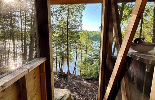 Wollaston RV Rental | Private Lakefront Glamping on 95 Acres, Rooftop Tent right on the Lake