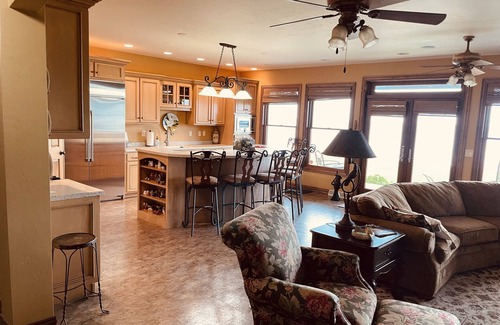 Ingalls House | Private lakefront home with 1,200 feet of sandy beach. A year-round retreat.