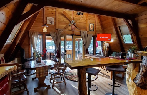 Coeur d'Alene Cabin | Private lakeside A-frame cabin w/hot tub, beach, docks, games. 4 season fun!