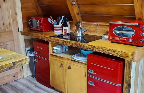Coeur d'Alene Cabin | Private lakeside A-frame cabin w/hot tub, beach, docks, games. 4 season fun!
