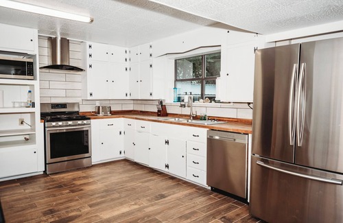 Camp Wood House | Private Nueces Riverfront Getaway! 13 Acre of Bliss! Sleeps 12-14