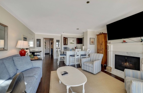 Boyne City Condo | Private Patio on Lake Charlevoix | Ground Floor Getaway with sunset views |