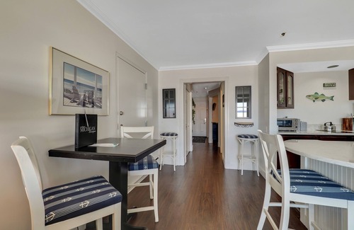 Boyne City Condo | Private Patio on Lake Charlevoix | Ground Floor Getaway with sunset views |