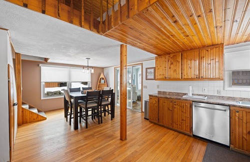 Portage Lakes Cottage | Private Portage Lakes Home. Water Views! 8 mins to beach! Jetted Tub. Sleeps 7