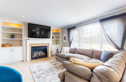 Bridgman House | Private property with three-season room, hot tub, firepit, games, W/D, & AC