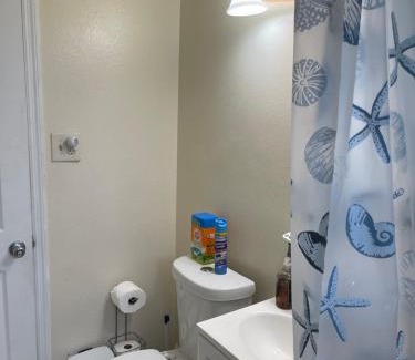 Fort Pierce North House | Private Queen Bedroom C shared common spaces
