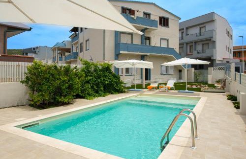 Lu Bagnu House | Private room and pool in the beach free wi-fi