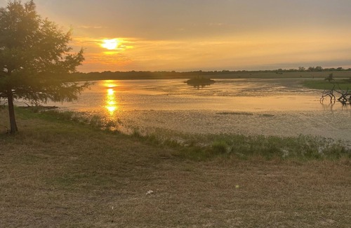 Miller Grove RV Rental | Private safari tent with ac/heat, Wifi and an exceptional view off a large deck.