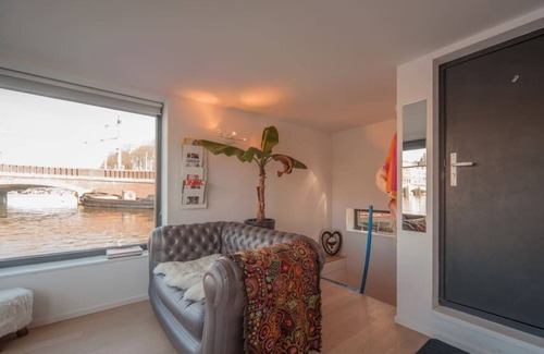 Weesperzijde Boat Rental | Private Studio Houseboat *BEST VIEW* @Amstel