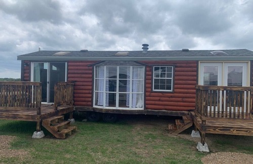 Platte RV Rental | Private Tiny Home with deck, fire pit & patio near Platte Creek Recreation area