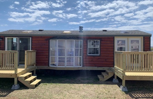 Platte RV Rental | Private Tiny Home with deck, fire pit & patio near Platte Creek Recreation area