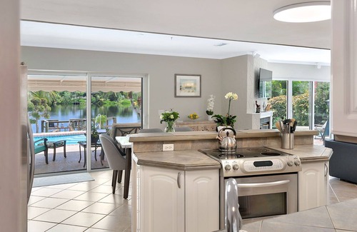 Palm Springs House | Private Waterfront Home, Family Friendly, Heated Saltwater Pool, Close to beach.