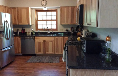 Interlochen House | Private, woods, trails, Duck Lake access, Kayaking, Interlochen concerts