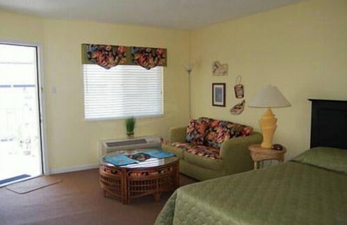 North End Condo | Professionally decorated with in ground pool. 1 1/2 blocks to the beach, boardwalk and shopping. Assigned off street parking! Unit 307