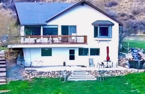 Great Falls Cottage | Prolific View on River w/Hot Tub. Fishing Boat available. Golf. 7.5 acres