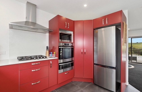 Mangawhai Cottage | Pukeko Paradise - Mangawhai Heads Holiday Home