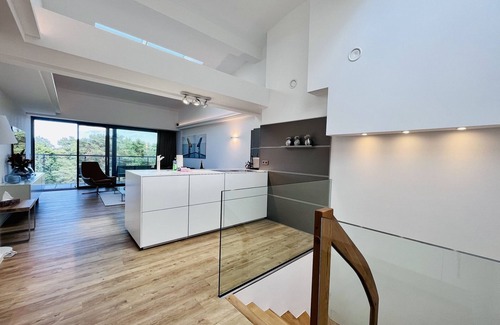 Prora Apartment | "Purbaltic" maisonette apartment with lake view and sauna, completed in 2022