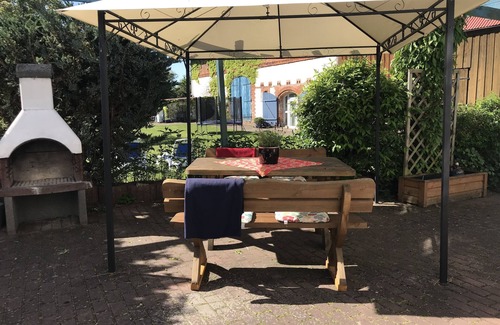 Crussow Apartment | Pure relaxation: first floor apartment, sun terrace with barbecue & fireplace, sauna