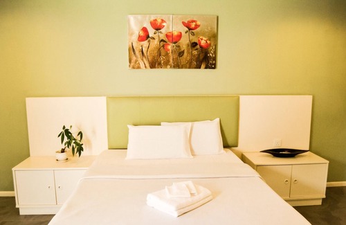 Telipok Hotel | Qi Hotel and Club