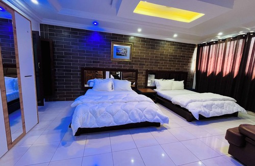 Ouakam Bed & Breakfast | Quad room