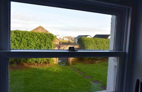 Laphroaig House | Quaint and quirky coastal Cottage Islay