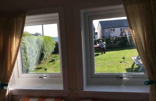 Laphroaig House | Quaint and quirky coastal Cottage Islay