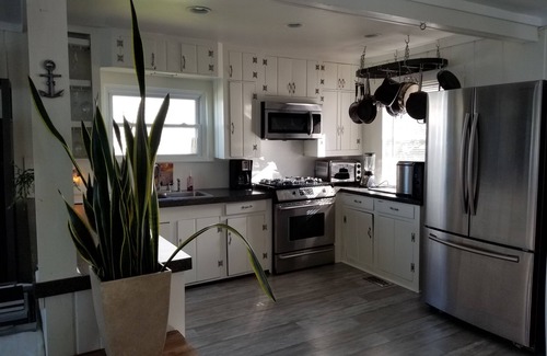 Kawkawlin Cottage | Quaint beach cottage with magnificent sunrises on Saginaw Bay/Lake Huron
