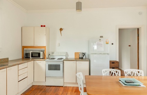 Ngakawau House | Quaint beachfront cottage. Sunny deck and views.