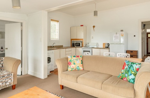 Ngakawau House | Quaint beachfront cottage. Sunny deck and views.