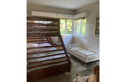 Deep Cove House | Quaint cottage within a 5 minute walk to Deep Cove, beach, & mountain adventures