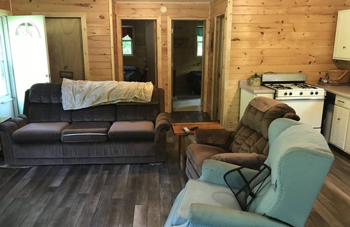 Manistique House | Quaint getaway to unwind and relax.