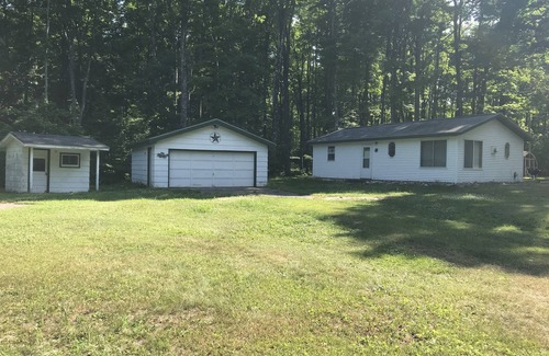 Manistique House | Quaint getaway to unwind and relax.