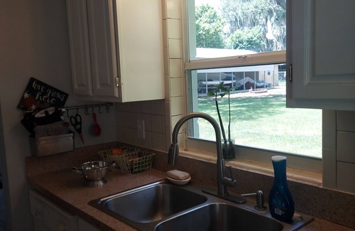 Sylvan Shores House | QUAINT HOME WITH VIEW OF LAKE CLAY ACROSS THE STREET FROM BOAT LAUNCH/DOCK