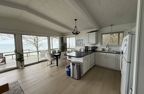 Fennville Cottage | Quaint lakefront cottage w/private hot tub, firepit, & beautiful sunset views