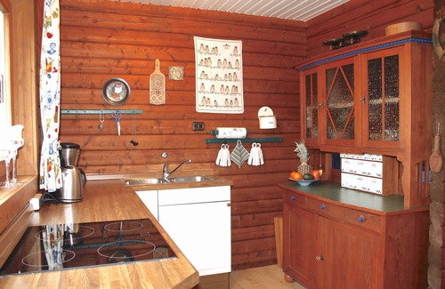 Gunneby House | Quaint, modern log cabin with barrel sauna, panoramic windows, Schlei view.