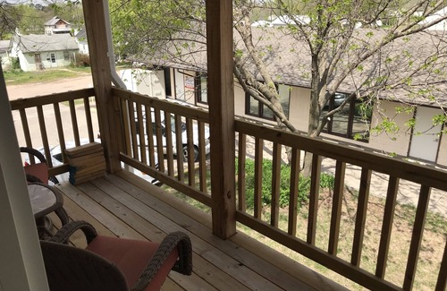 Superior House | Quaint Upstairs Apartment with peaceful treetop deck, close to downtown.
