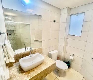 Pituba Apartment | Quarto e sala bem localizado