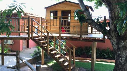 Pescaria Apartment | Quarto e sala com piscina em Maceió - Villas Tulipa 02