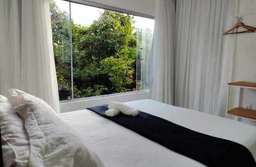 Pescaria Apartment | Quarto e sala pratagy