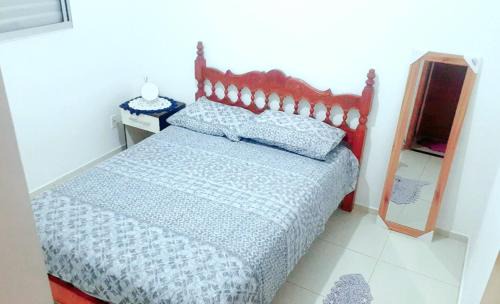 Suzano House | Quarto em apartamento