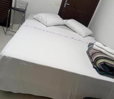 Plano Diretor Sul House | Quarto em residencia